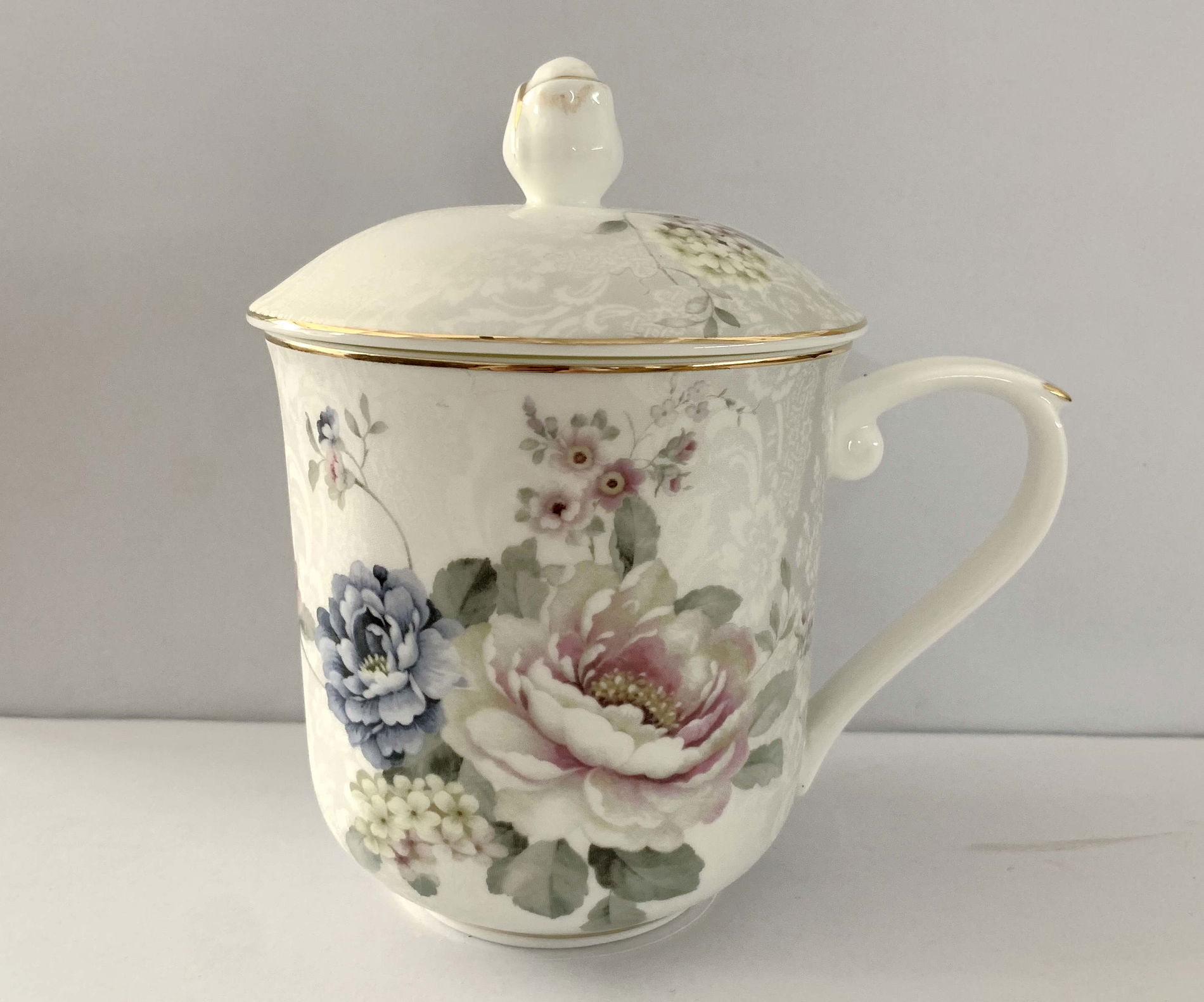Kubek porcelanowy z zaparzaczem i pokrywką 400 ml