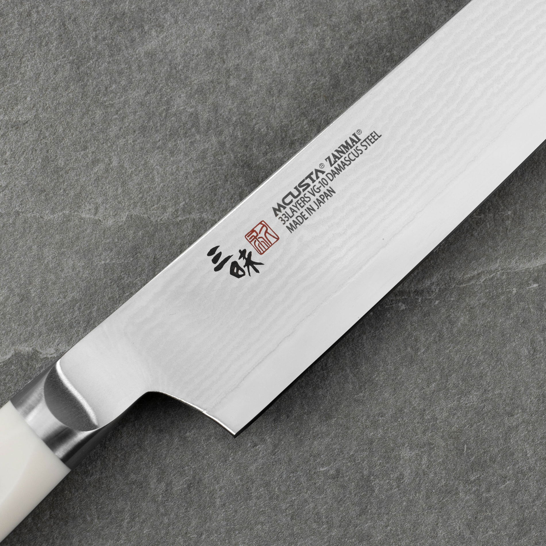 MCUSTA Zanmai Classic Damascus Corian 24 cm - japonský nôž Sujihiki z damaskovej ocele