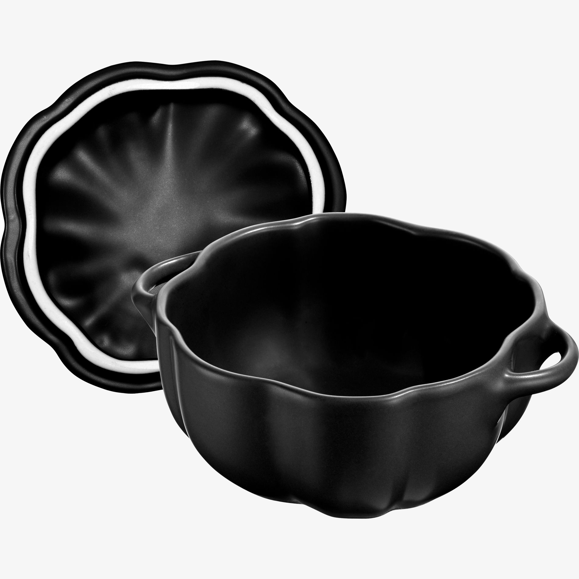 Ceramiczny korpus pokryty emalią w naczyniu Staub Ceramiczny korpus pokryty emalią w naczyniu Staub